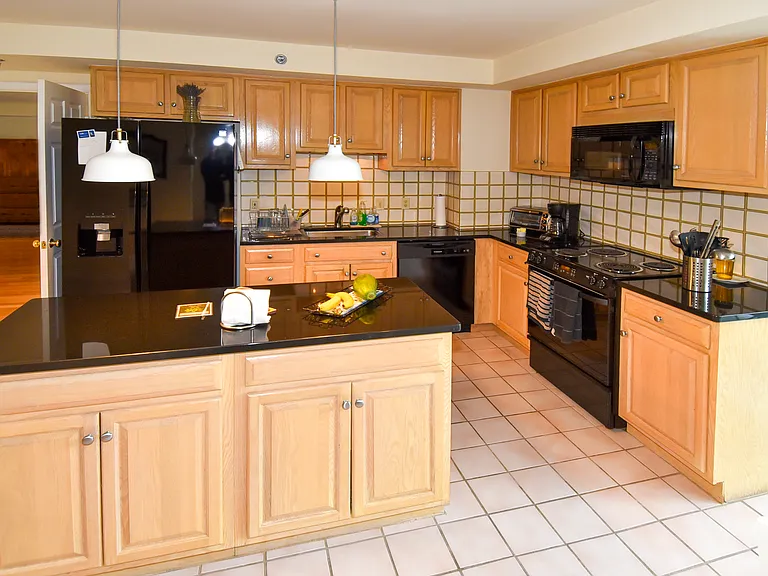 5450 Whitley Park Ter #212 — Photo 8