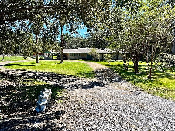 Home has circle driveway