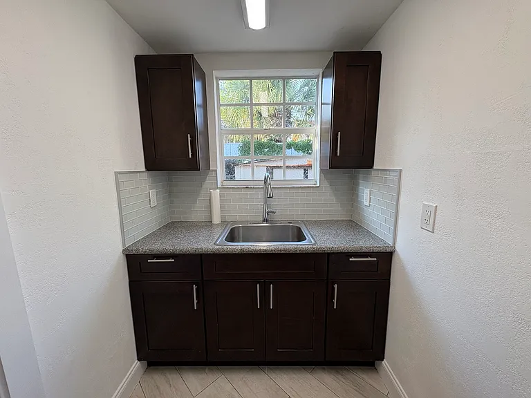Kitchen granite sink and cabinets