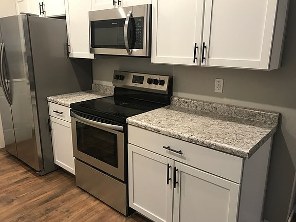 Kitchen appliances included.