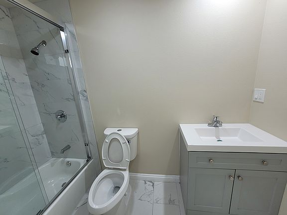 Bathroom for master bedroom with bathtub