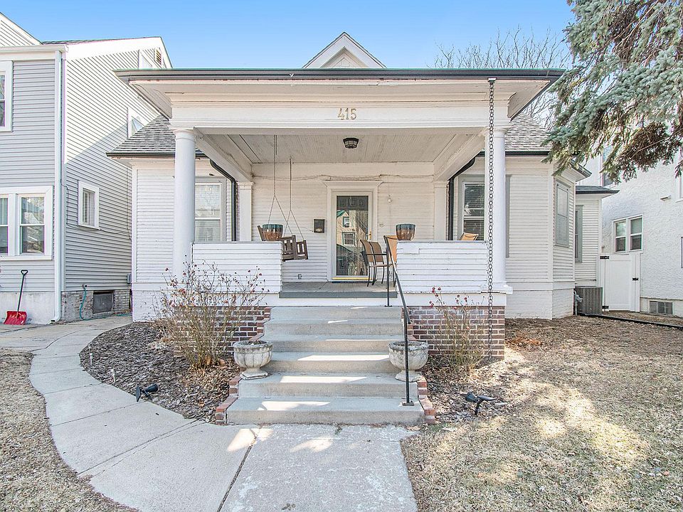 Front porch with idyllic porch swing and space for table. Wifi reaches outside!