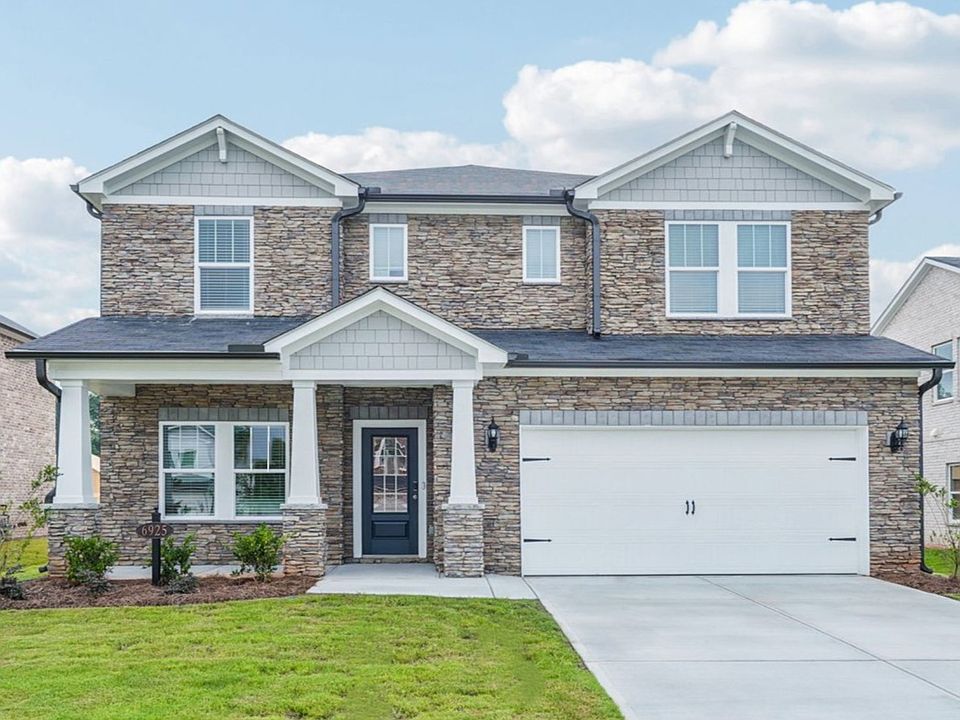The Johnson floorplan with Elevation J modeled at Harmony Manor.