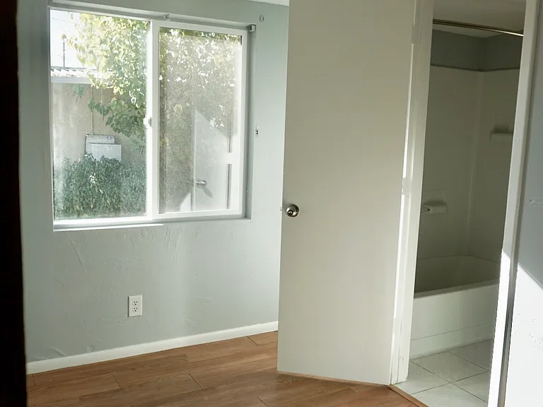 Bonus room / additional space attached to bedroom #2. Also entryway to full bathroom.