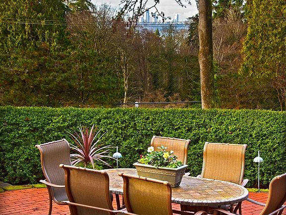 Charming brick patio with with views of the city.