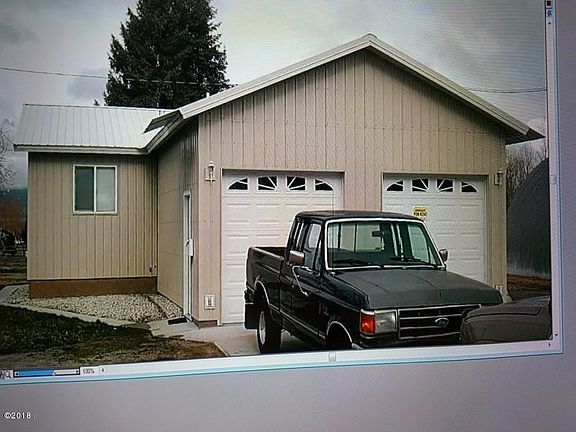 Single garage for each duplex unit.