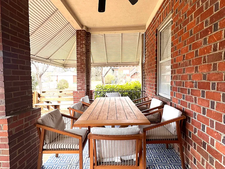 Back deck area covered with outdoor dining