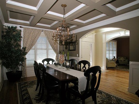 Formal dining room has coffered ceiling also! Beautiful!
