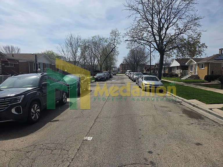 11004 S Eberhart Ave — Photo 5
