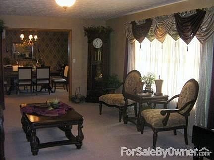 Formal Living & Dining
						:
						A place to get away from the TV! Enjoy a quiet reading area