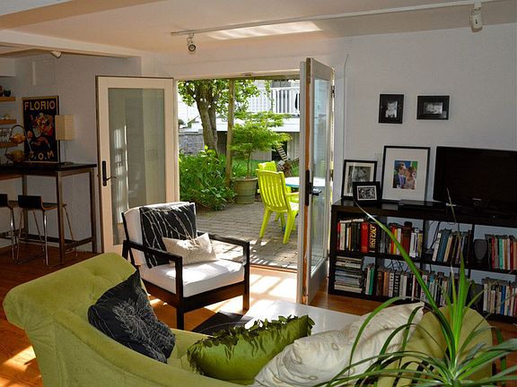 living room opens to patio