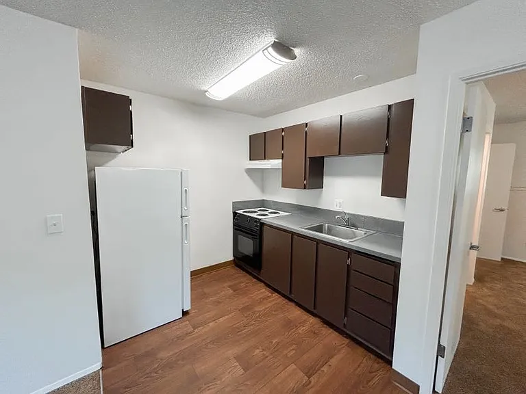 Village Manor — Photo 14