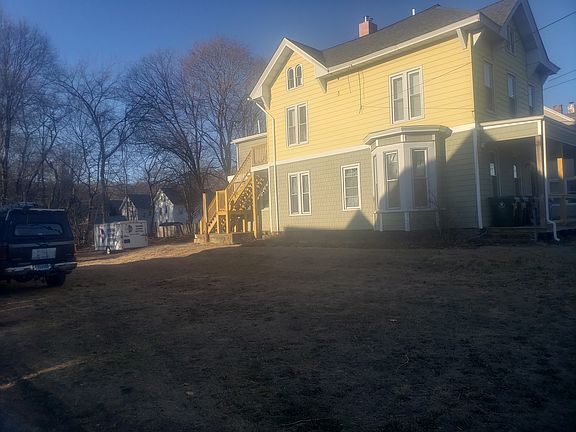 Exterior with large yard, House sits on 2 acres