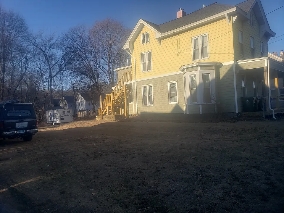 Exterior with large yard, House sits on 2 acres