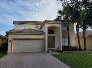 214 Seminole Lakes Dr, Royal Palm Beach, FL 33411