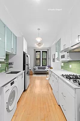 2nd image of 204 E 7th St APT 1