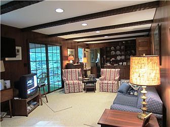 Fabulous family room with wood beam accents