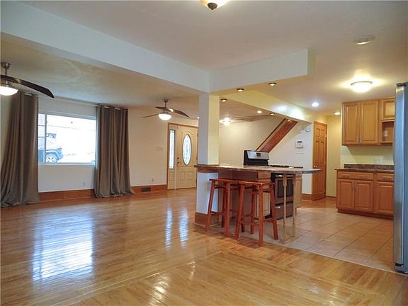 Beautiful Open-Concept main floor boasts recessed lighting along with tons of natural light.