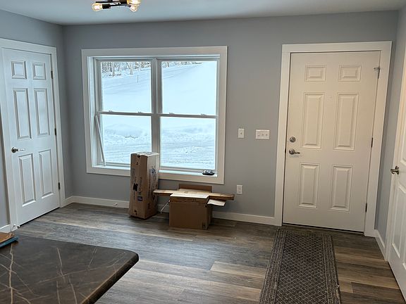 Entryway and eat in dining area