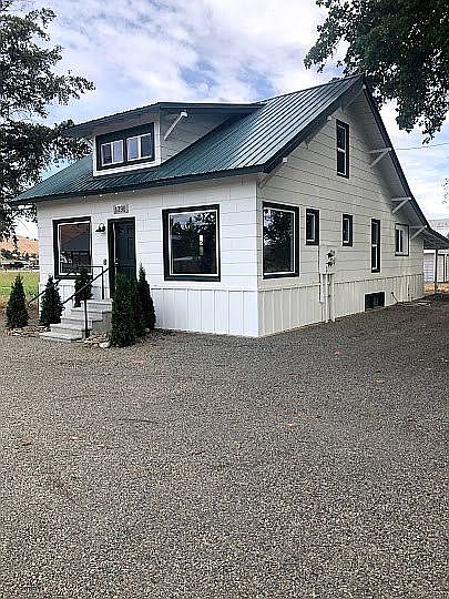 Driveway and NW side of home