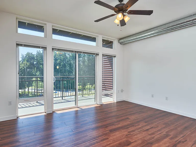 Living Room with Balcony and Hard Surface Flooring