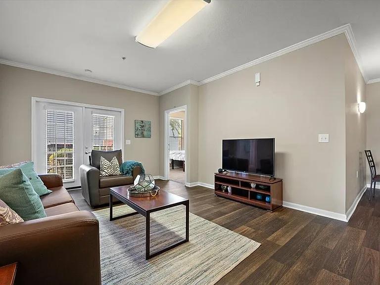Relax in the Spacious and Comfortable Living Room at Eagle Flatts Apartments
