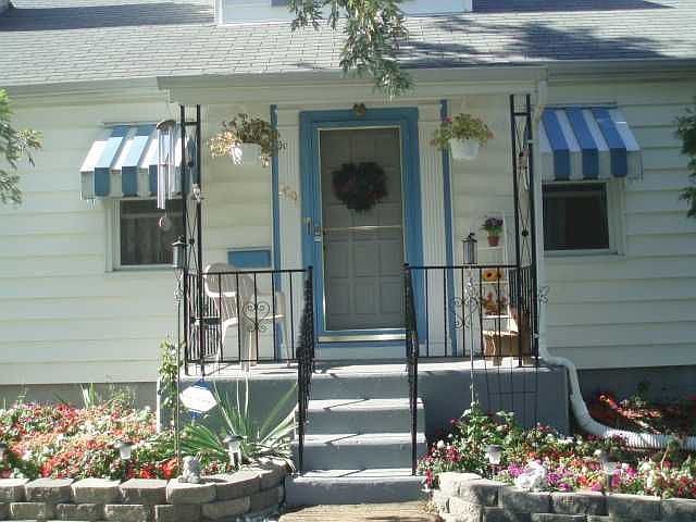 Close up of front with nice, freshly painted porch