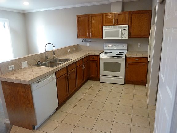 Updated kitchen with semi-pro faucet and crown molding and lots of counter space