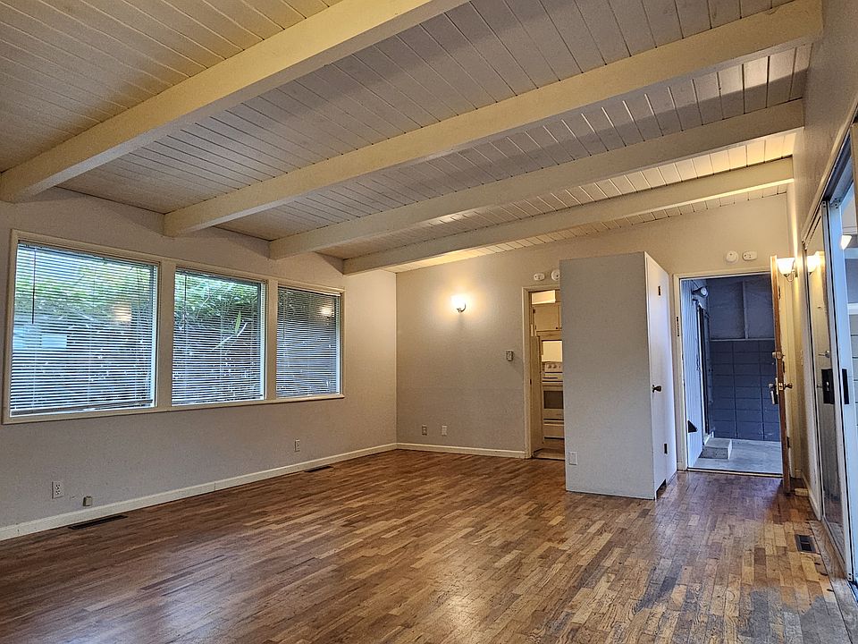 Living room with vaulted ceiling