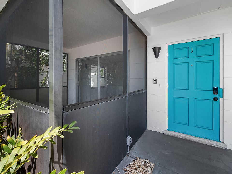 Unit 1 is downstairs. There are only four units in this boutique building.