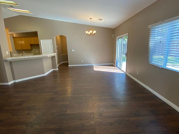 Dining with sliding door to large backyard