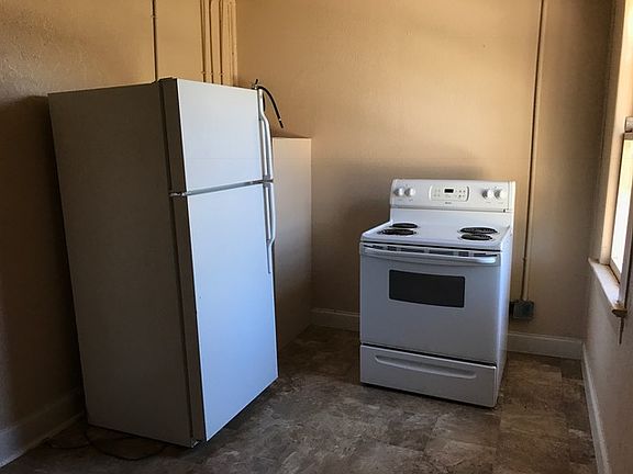 Fully set up kitchen as you walk in.