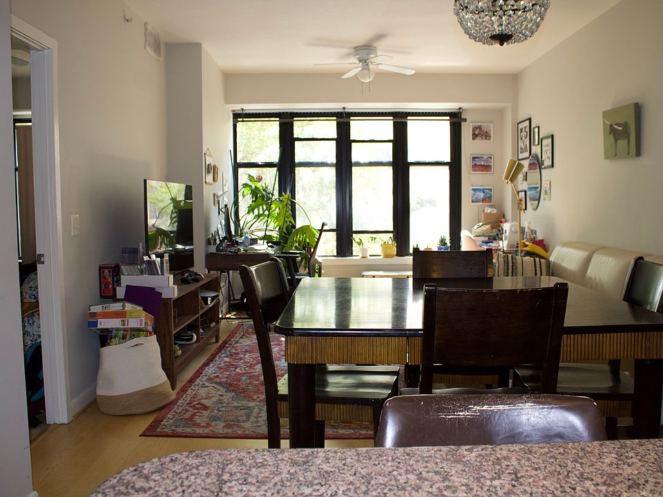 View of living and dining areas from kitchen