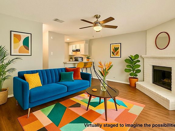 Spacious and full of natural light, this welcoming living area offers the perfect setting to unwind or entertain with ease.