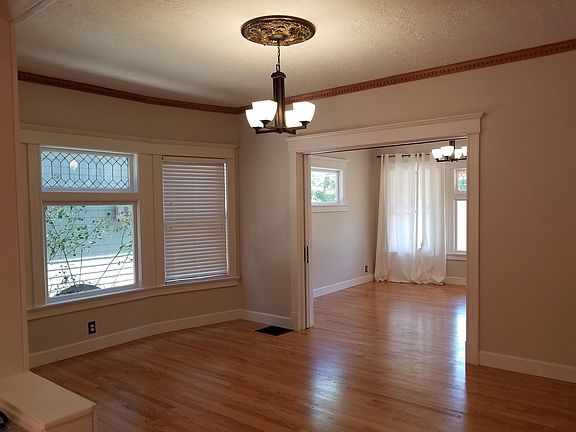 Dinning room and view of living room through pocket doors