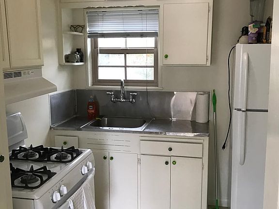 Spacious kitchen with stove and refrigerator included