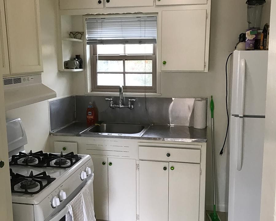 Spacious kitchen with stove and refrigerator included