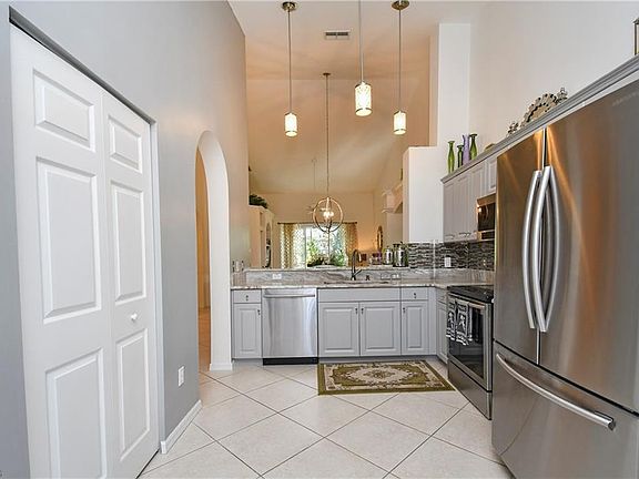 New kitchen with stainless steel appliances.