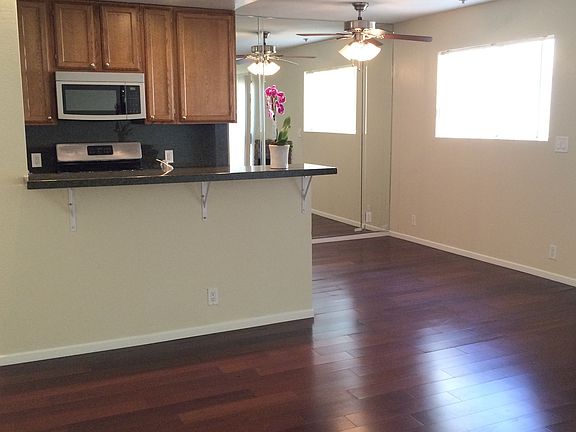 Dining area off kitchen with mirrored wall