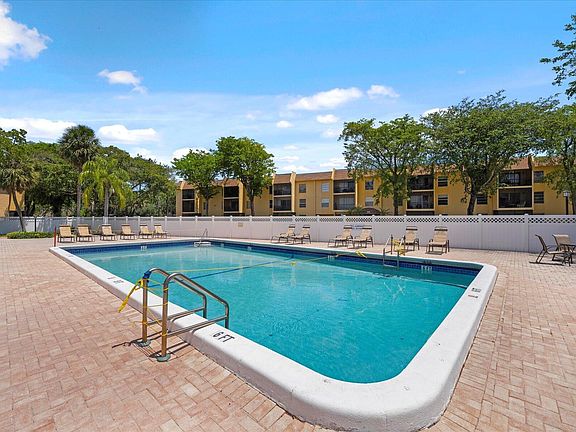 large heated pool next to condo