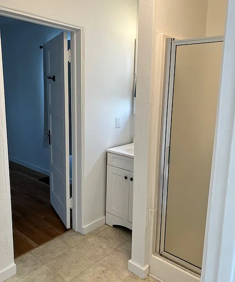 Bathroom looking toward back bedroom