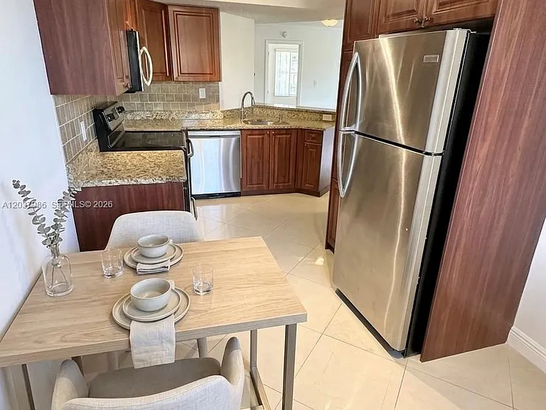 8955 Wiles Rd #208 — Photo 5