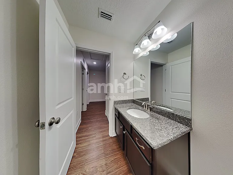 6609 Hidden Rose Pl — Photo 17
