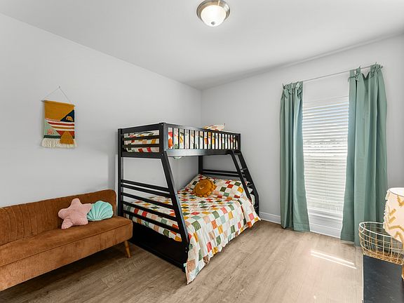 A kid-approved space with bunk beds and fun decor