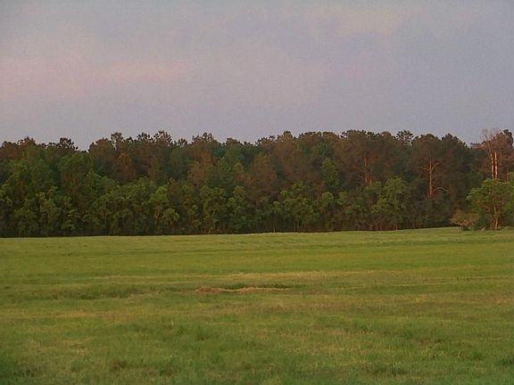 12+ beautiful acres  This view is looking toward the east with the afternoon sunset colors.