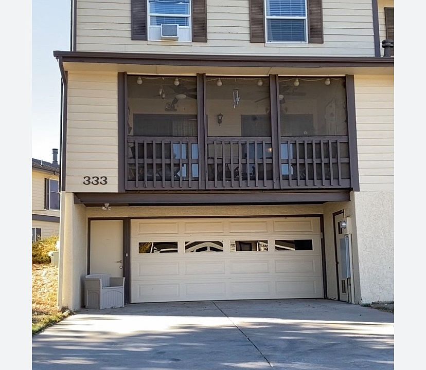 End unit townhouse with 2 car garage and 4 car driveway