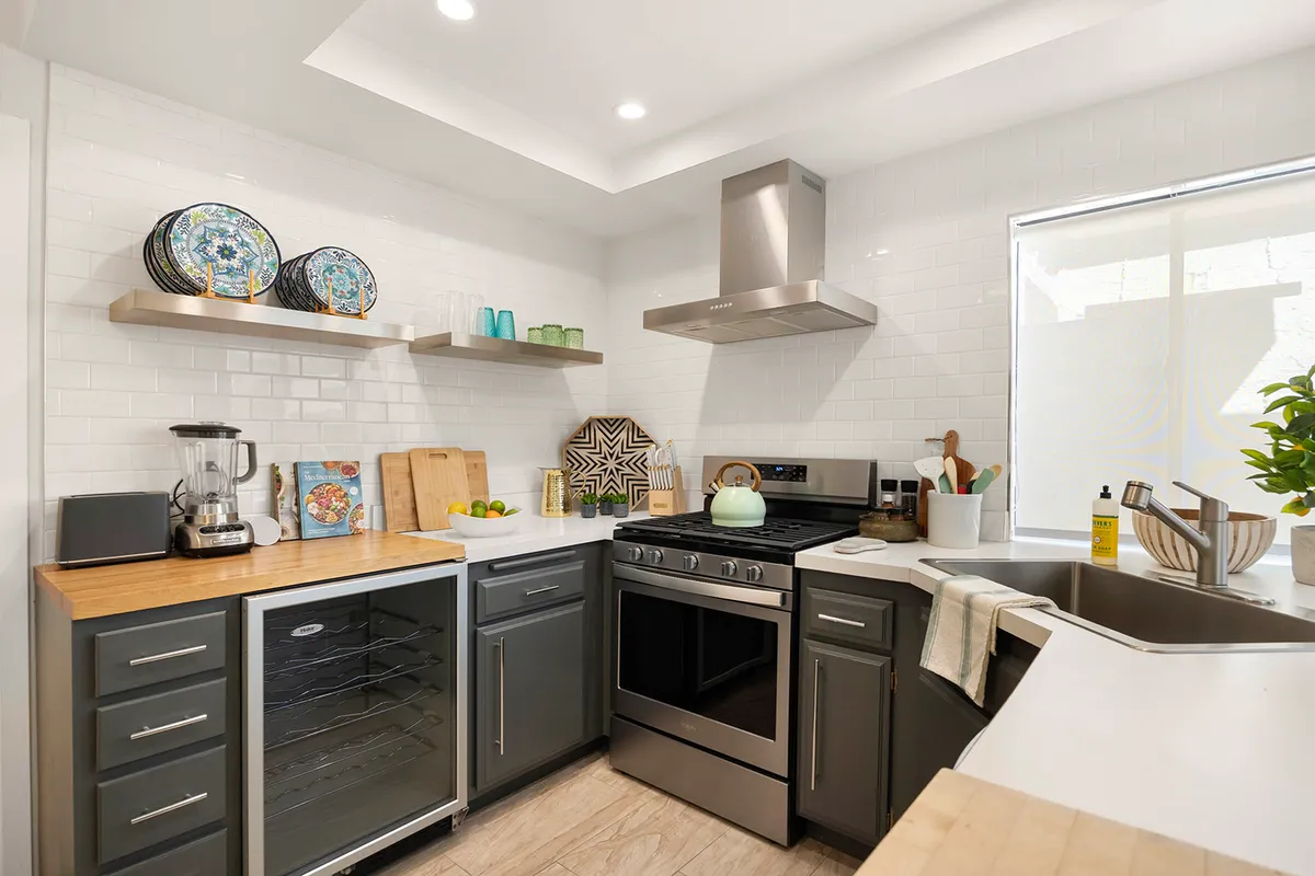 Kitchen area. All new stainless steel appliances, plus a 20 bottle wine frig. - 2355 S Gene Autry Trl #C