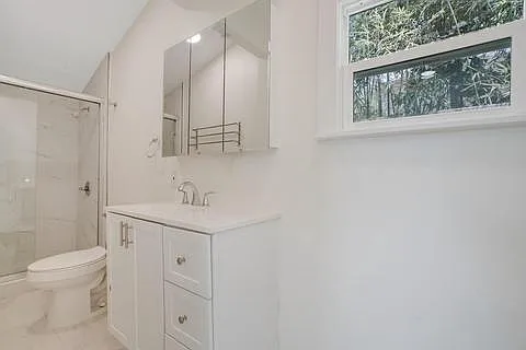 2nd bathroom, window faces rear yard