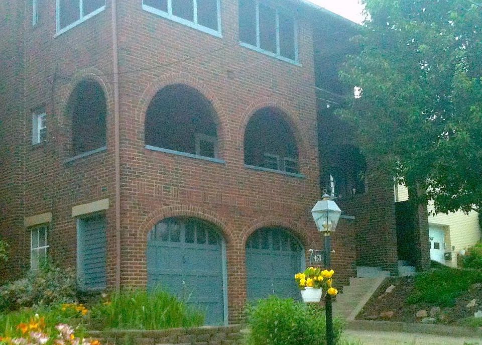 Private garage and parking place in driveway