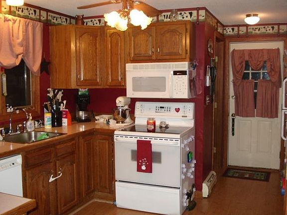 Updated Kitchen overlooking fenced in yard!